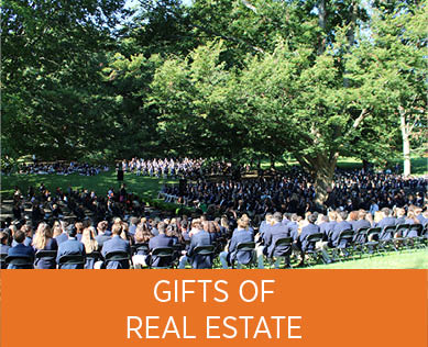 People attending graduation. Links to Gifts of Real Estate
