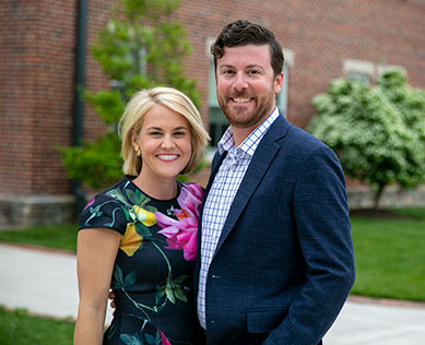 Photo of a woman and man smiling for a picture. Link to Life Stage Gift Planner Under Age 45 Situations.